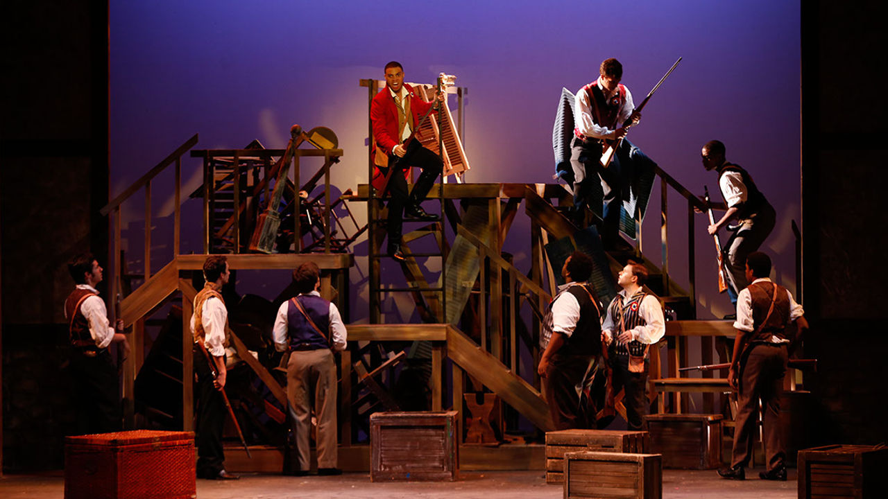 Revolutionaries atop the barricade in Les Miserables